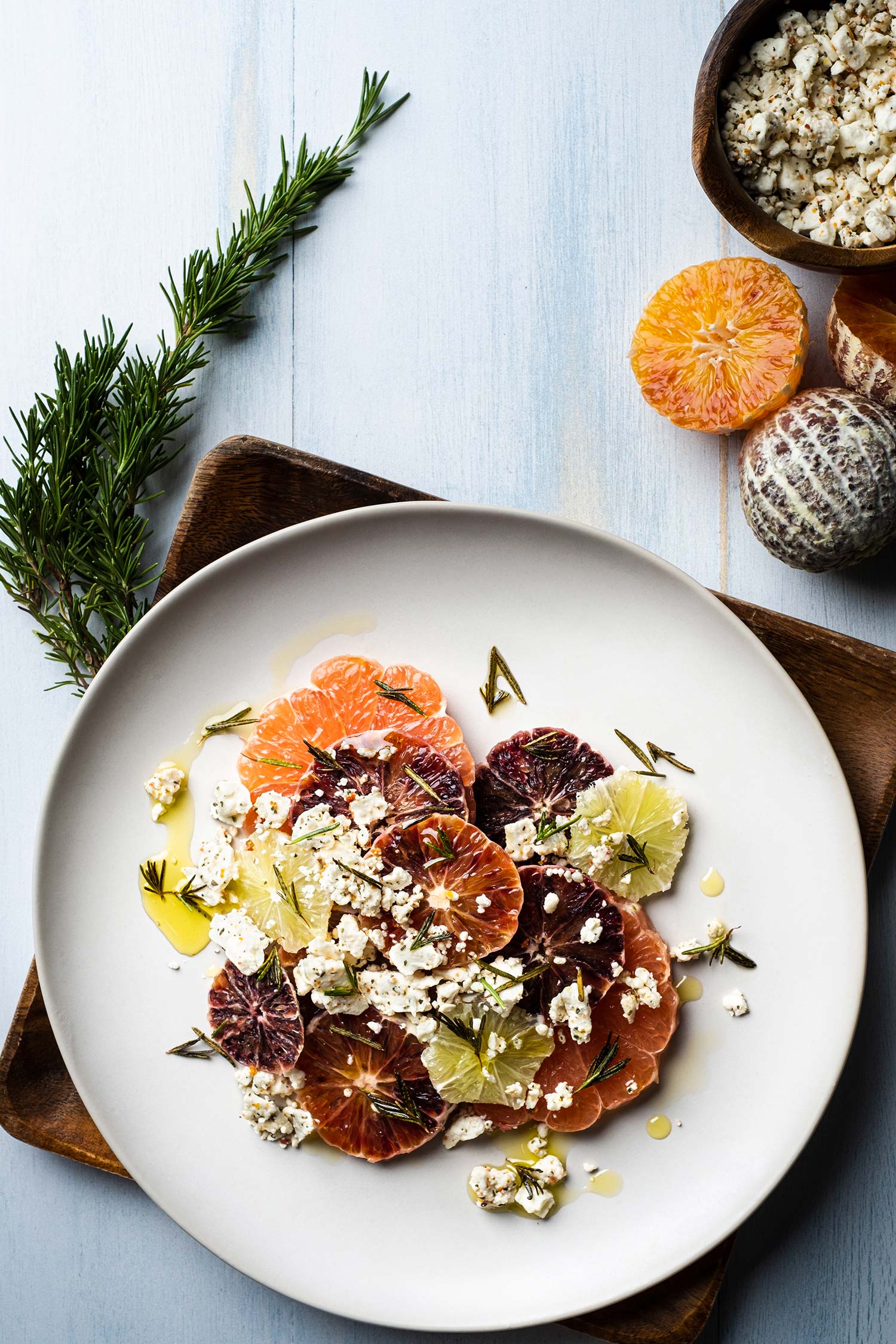 Citrus Salad on the textured wooden vesper backdrop